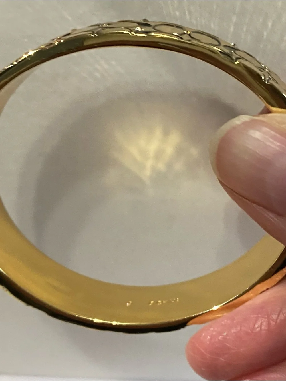 Gold-toned Coach Bangle